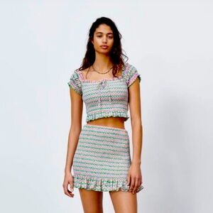 Zara women’s green and purple daisy shirt and skirt